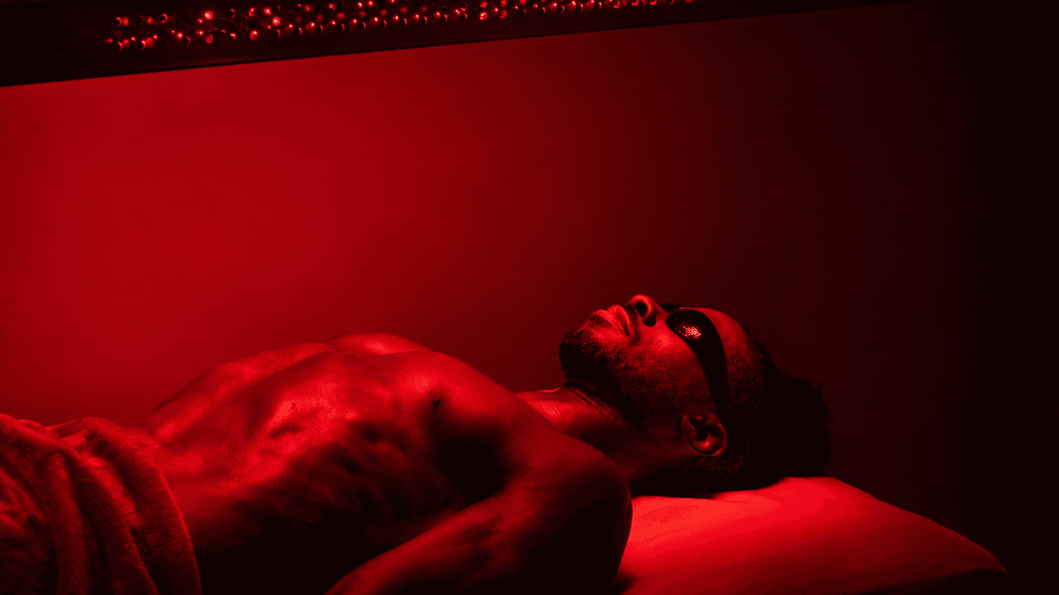 Man receiving Red Light and PEMF Fusion